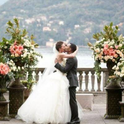 Tina Teigen half-sister Chrissy Teigan with spouse John Legend at their wedding